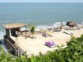Manmade sunbathing area at African Village Hotel