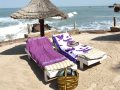 Relaxation on manmade sundeck at African Village Hotel