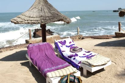 Relaxation on manmade sundeck at African Village Hotel