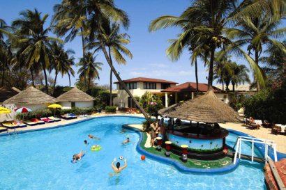 Pool with swim-up bar at African Village Hotel
