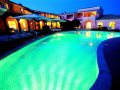 Hotel and Pool Area by Night