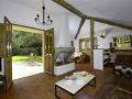 Open plan lounge with dining and kitchen areas