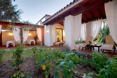 Relaxation area overlooking the private, tranquil herb garden.
