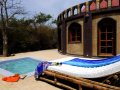 Suite with plunge pool and day bed at Sandele Eco-retreat