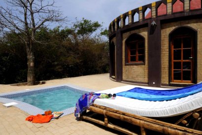 Suite with plunge pool and day bed at Sandele Eco-retreat