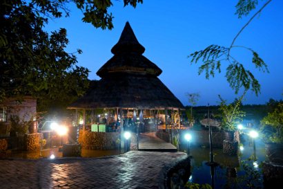 Bar area by night at Mandina Lodges
