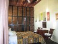 Standard 'garden' room at Hibiscus House