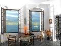 Living/dining room with sea views